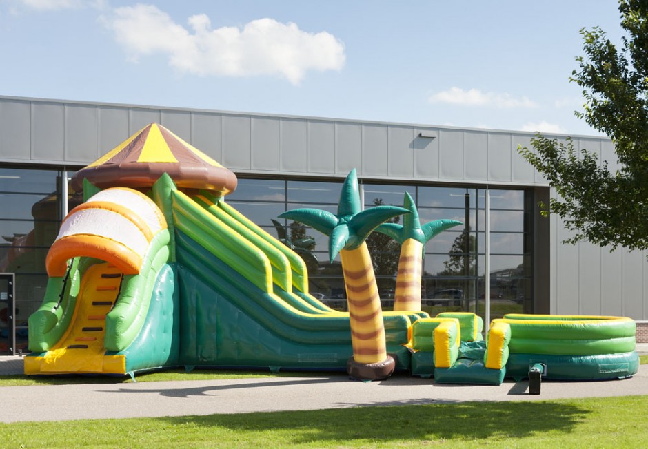 wholesale 15m Inflatable jungle bouncer with slide suppliers